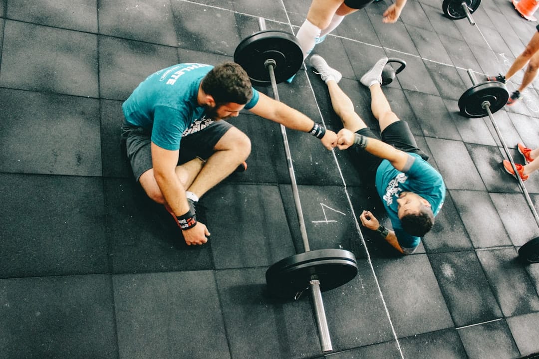 Gym members celebrating with real rewards like branded merchandise, showcasing strong gym member engagement and community.